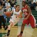 Dexter's Makenzie Svihra drives the ball down court against Canton's Alanna Brown during the forth quarter of  the regional semifinal game at Novi High School Tuesday, Mar. 5th.
Courtney Sacco I AnnArbor.com  